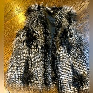 Lightly worn animal print faux animal hair vest